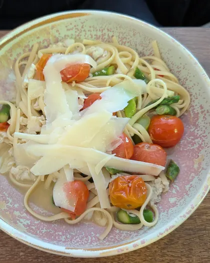 Blue swimmer crab linguine with cherry tomatoes and shaved parmesan